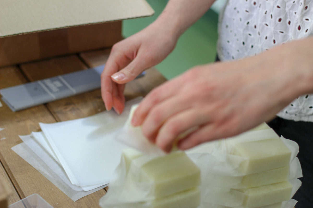 hand wrapping soaps in plastic free wrappers